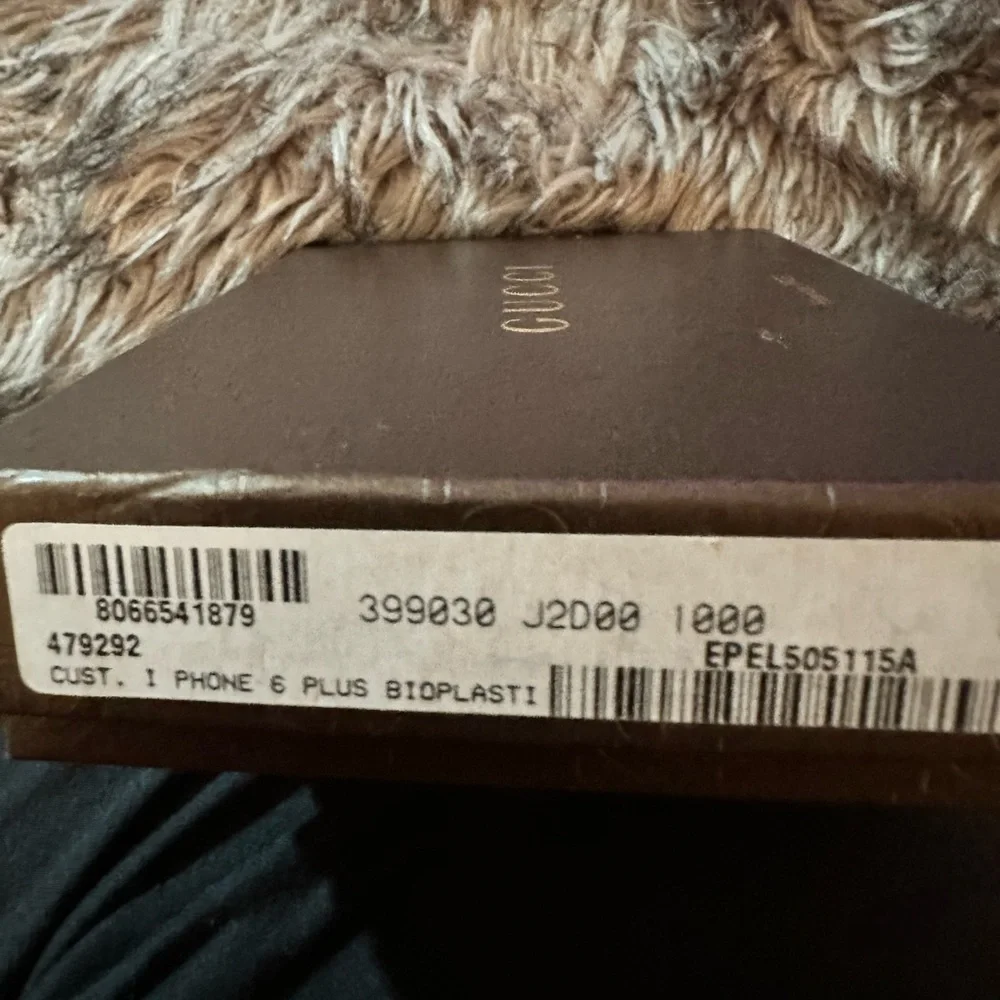 iPhone 6-Plus Gucci case and Gucci SKU on original box.